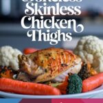 Juicy crusted baked chicken thigh on a white plate surrounded by cauliflower, broccoli, and carrots. Text reads "Juicy baked boneless skinless chicken thighs. Never dry, always delicisous!"