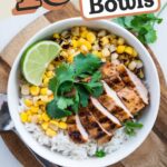 a Pinterest Pin with an image of a Chicken Rice Bowl that visually highlights the vibrant colors and textures of the dish. Include the following elements grilled chicken pices, white rice, charred corn, fresh cilantri garnich and slice of lime. Text reads "10 Chicken & Rice Bowls for Easy Weeknight Dinners
