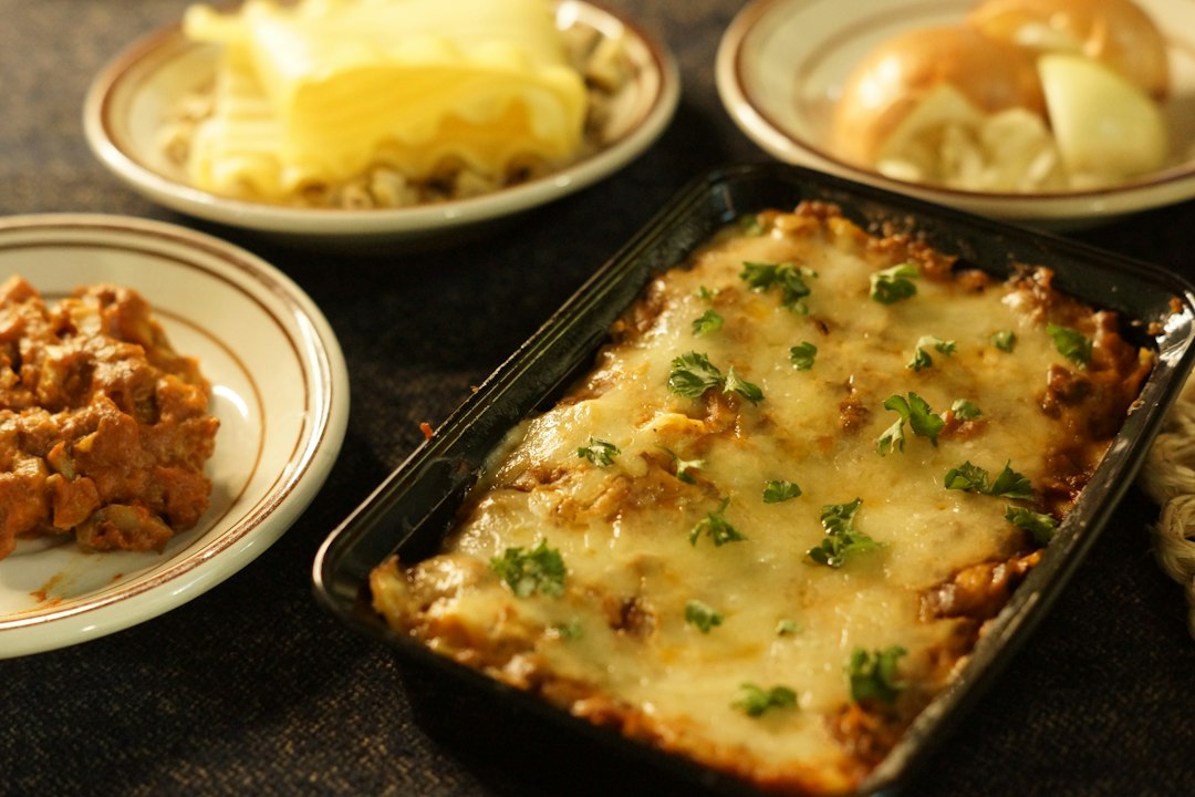 Cheesy baked casserole in a glass dish