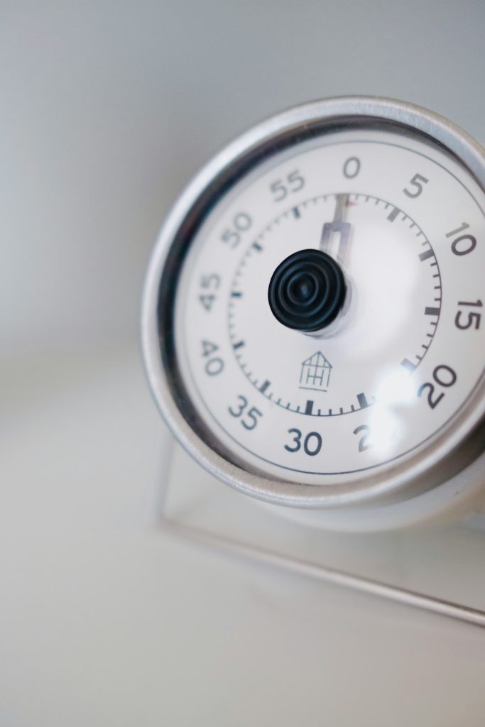 White kitchen timer dial set to zero